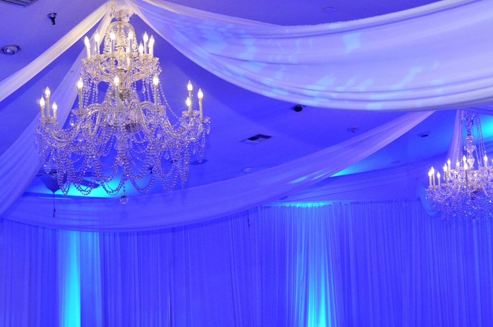 blue lights on a dance floor by Meisner Productions