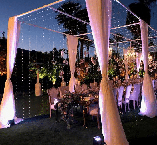 outdoor tented room with fairy lights from Dawn Gilmore Productions