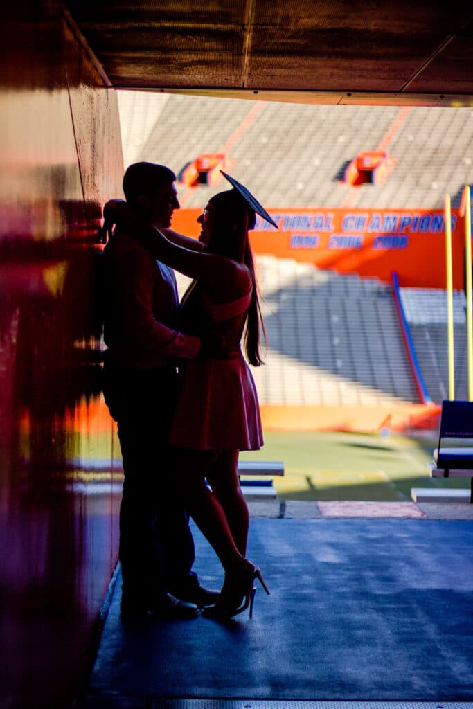 Couple embracing at University of Florida graduation