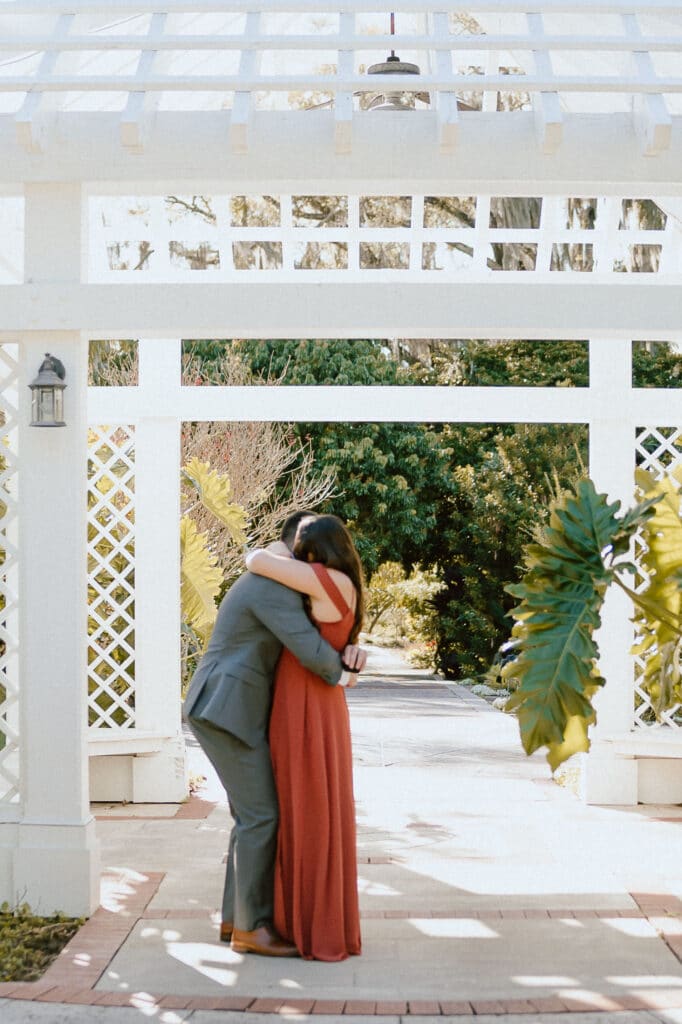couple embracing after Botanical Gardens Marriage Proposal