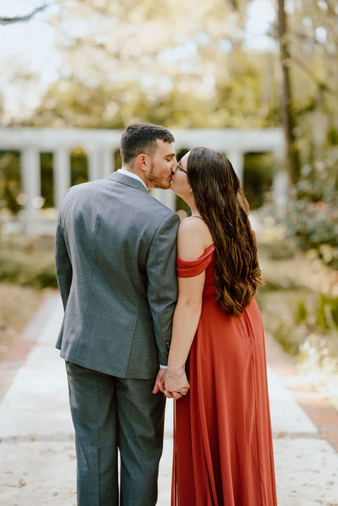 couple kissing after Botanical Gardens Marriage Proposal