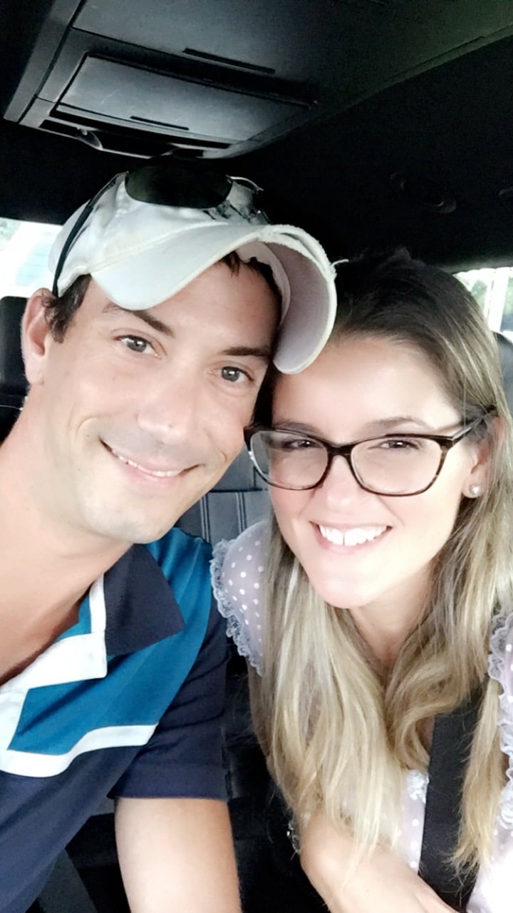 Couple in car posing for selfie