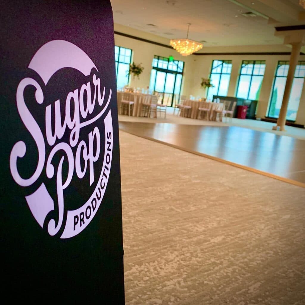 banner of SugarPop Productions ready at event