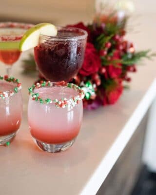 holiday signature drink with red and green rimmed glass poured by My Bar Service
