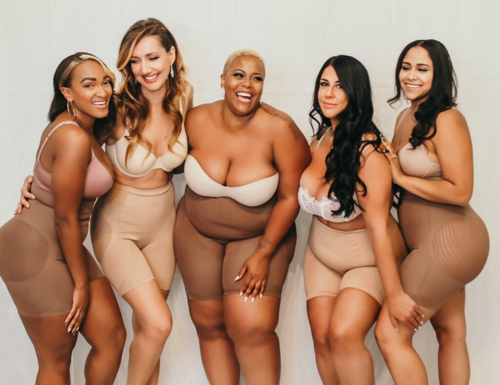 women of all colors and sizes ready to try on wedding gowns at the Ivy Bridal Shop