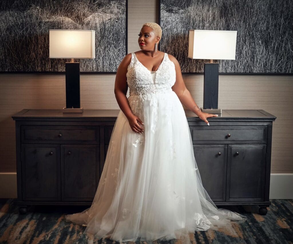 plus size model in wedding gown from the Ivy Bridal Shop
