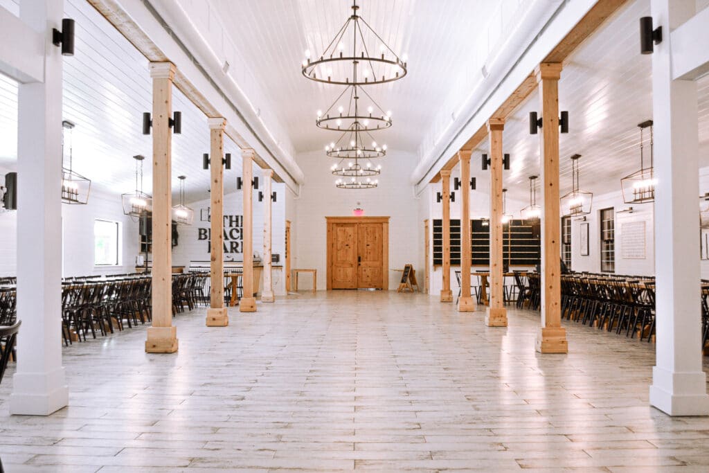 chapel with white and wooden pillars at The Black Barn
