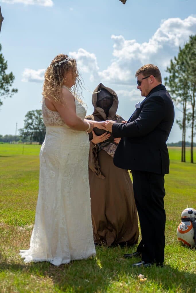 Bride and groom exchanging Star Wars Vows