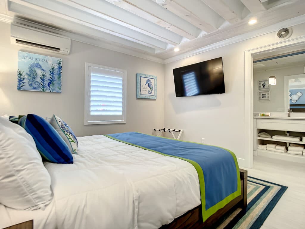 nautical bedroom with shiplap ceiling at Joy by the Sea