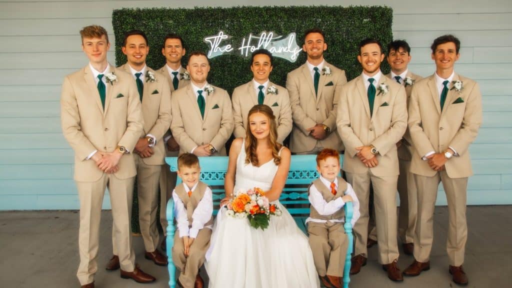 bride with silk autumnal bouquet with groomsmen and ring bearers all with boutonnieres from Wedding Day Flower Rental