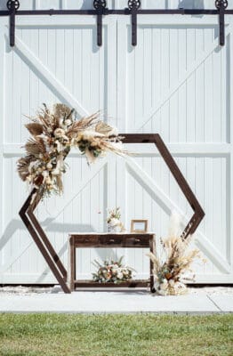 natural wood frame with grasses by Making It Matthews