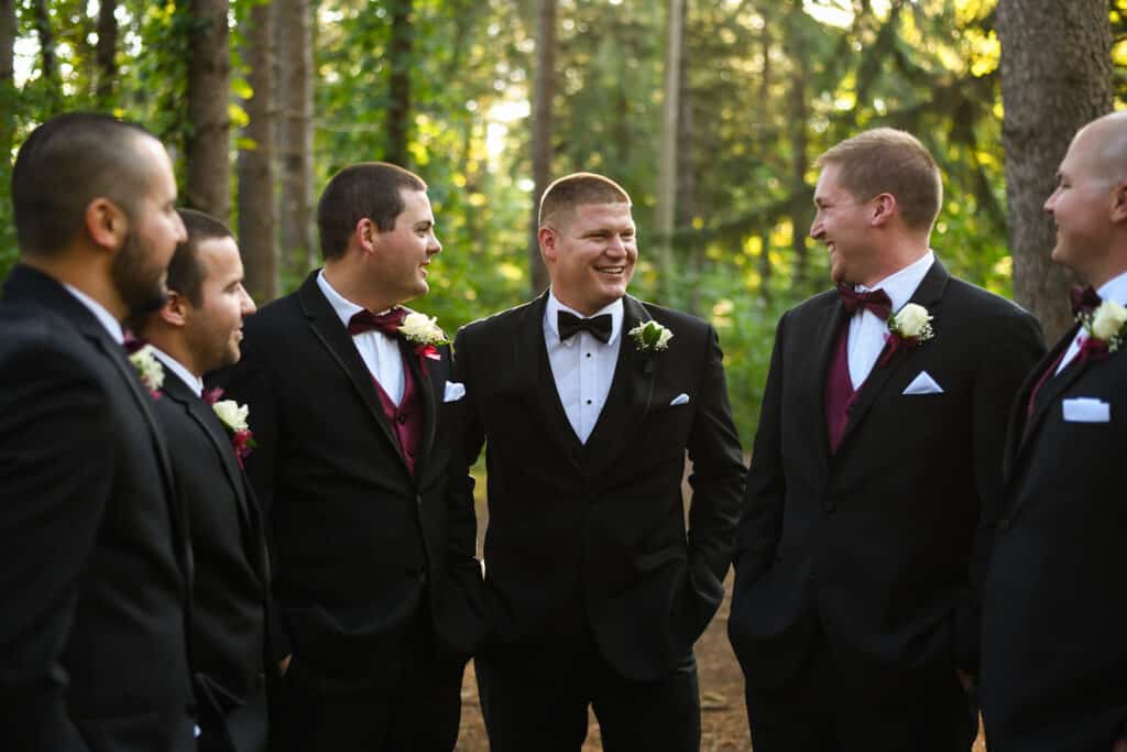 groom and his attendants in tuxedos waiting to start the wedding, photo from Weddings By Ray