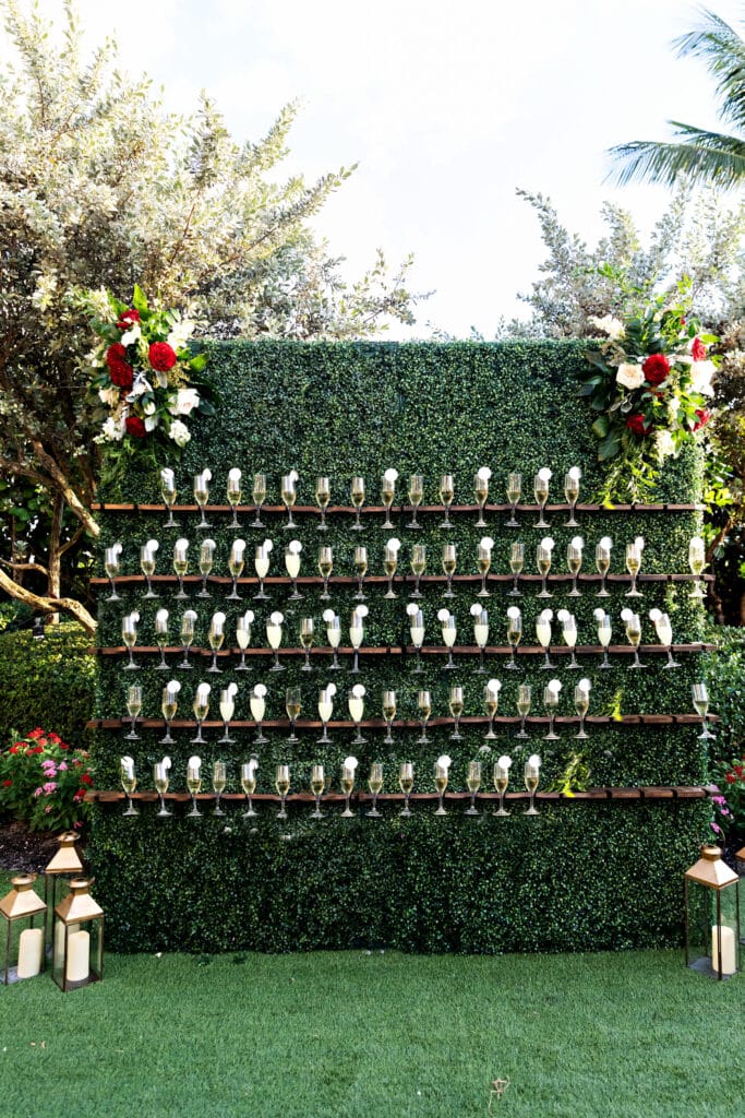 champagne wall at event planned by Just Save the Date