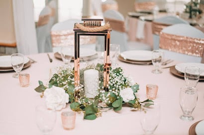 pink tablecloth set with white and gold accents for dining by Making It Matthews
