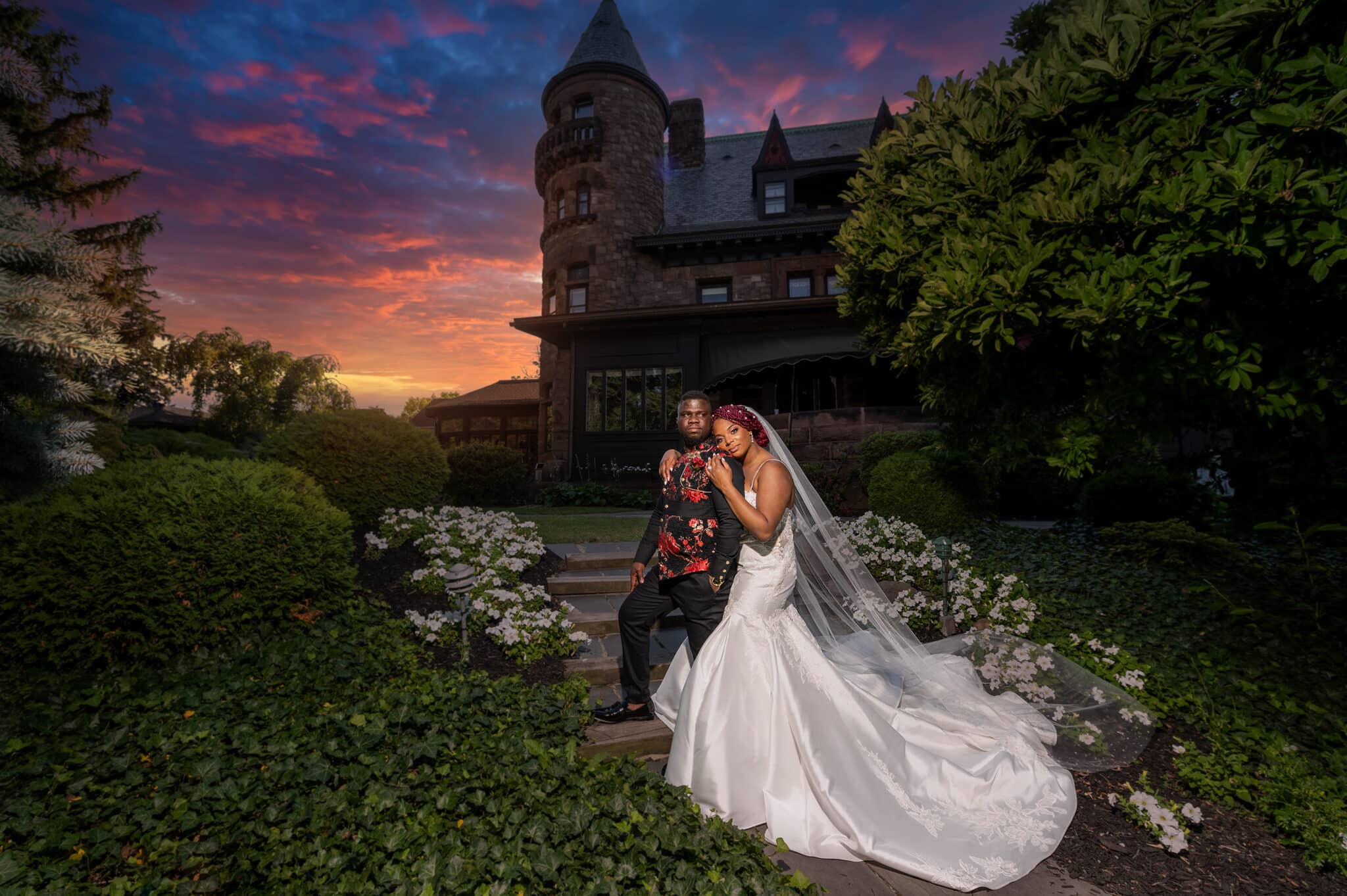 bride and groom night photo with stunning sunset