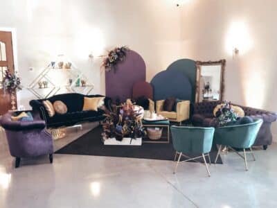 lounge area done in plums and teal by Making It Matthews