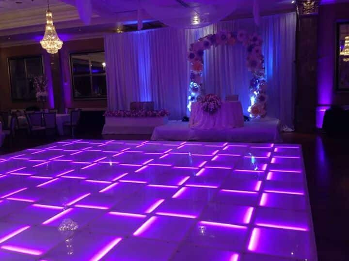 purple lit up dance floor by letz dance on