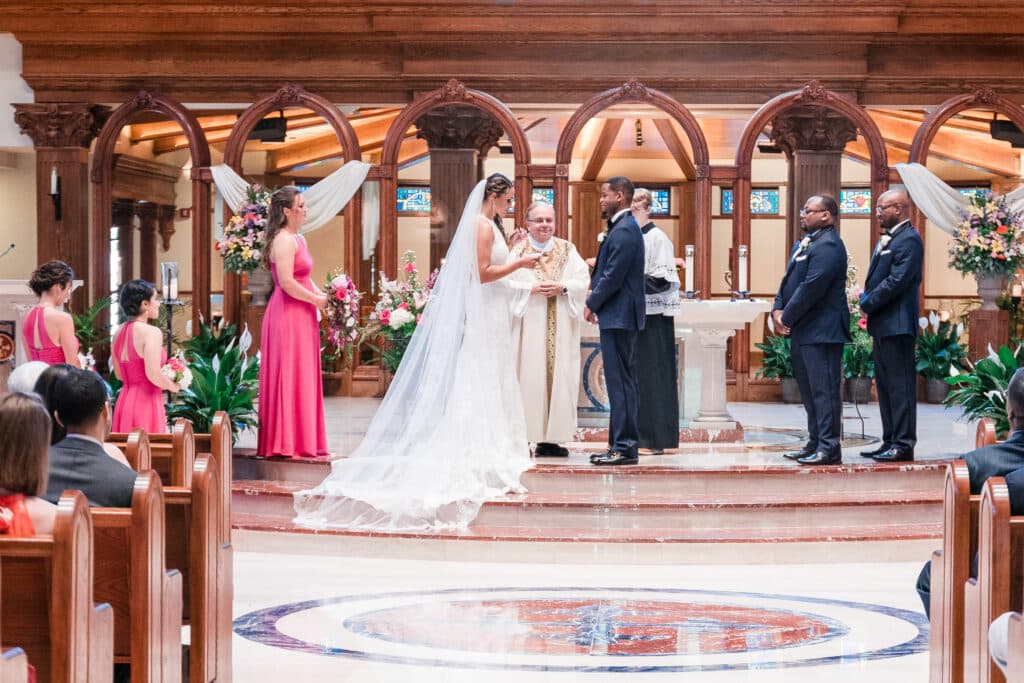 bride and groom at altar saying vows photo by Jerzy Nieves Photography LLC
