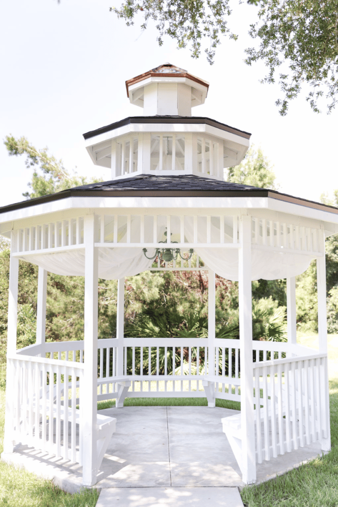 beautiful and intricate white wooden gazebo at The Carriage House at Vedder Farms