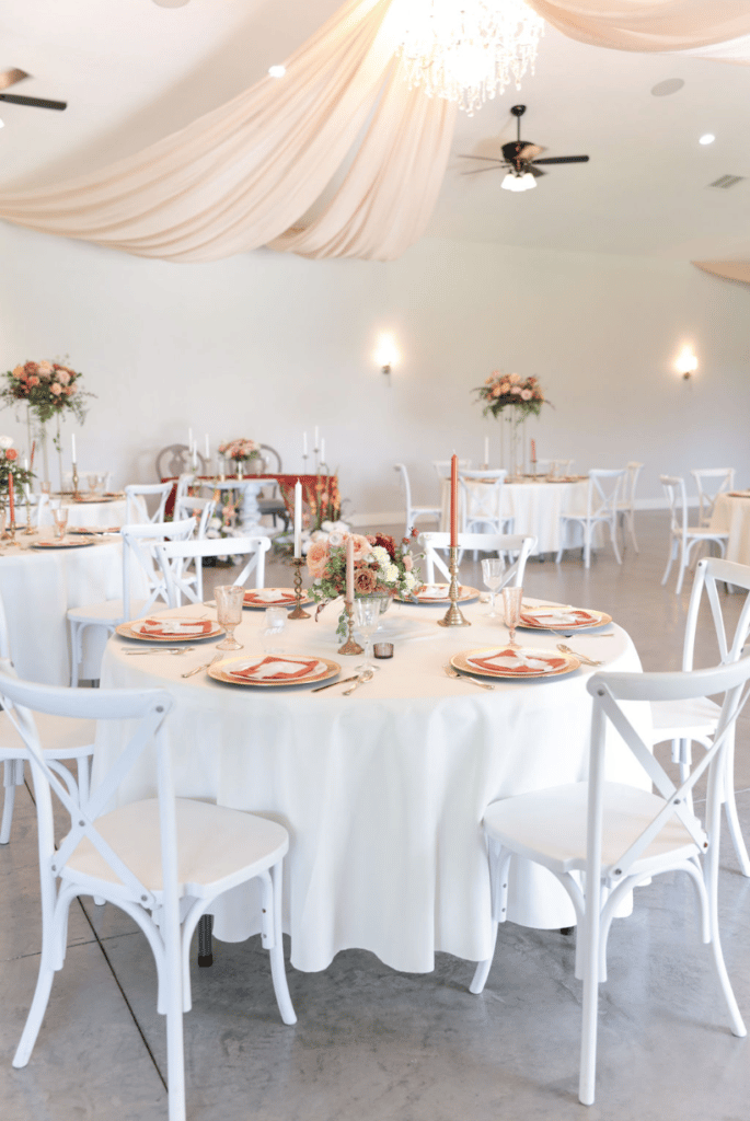 all white wedding reception under white draped ceiling at The Carriage House at Vedder Farms