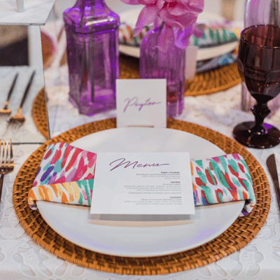 colorful tablescape with printed menu and placecards by Ever Ella