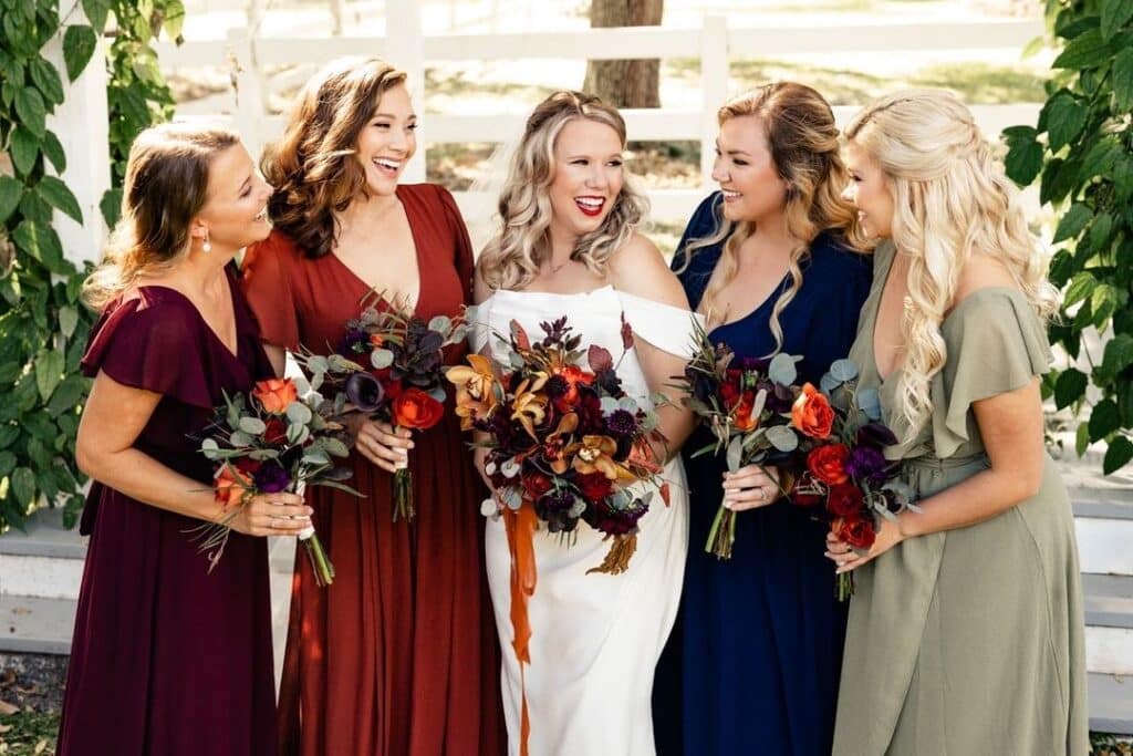 bridal party in autumnal colors with stunning fall bouquets from Sweet Pea Design Collective to reflect the season