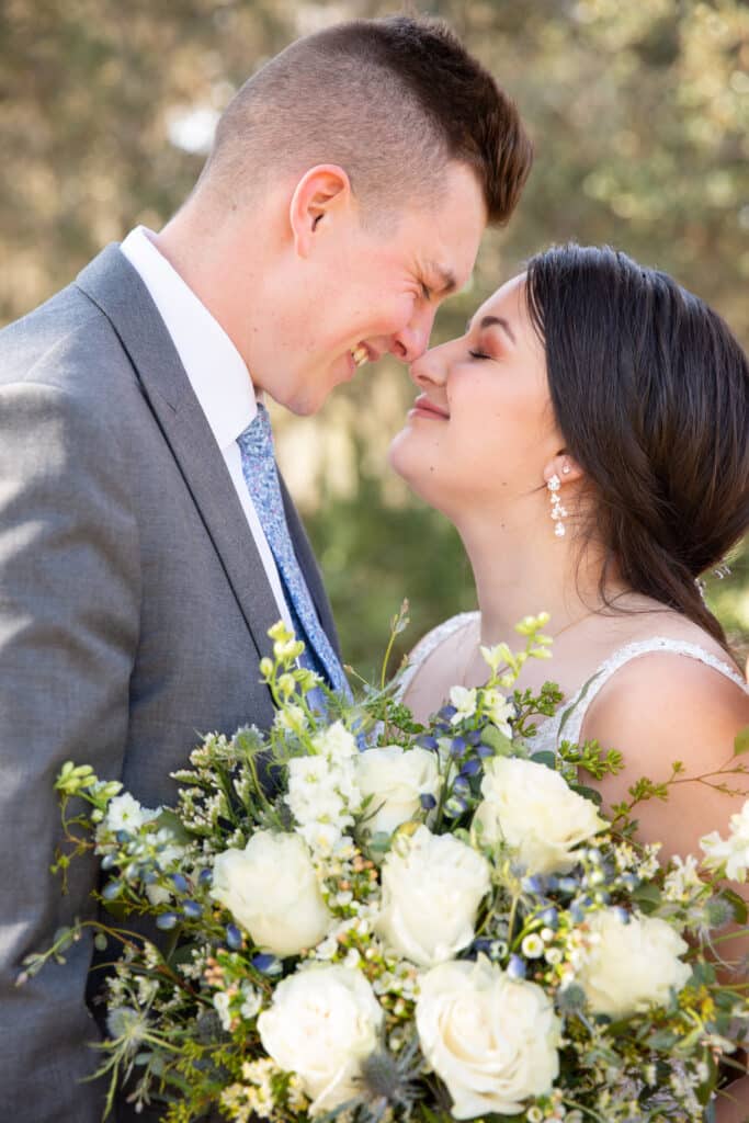 bride and groom kissing at the Diamond L Venue in Volusia County, near Deltona, FL