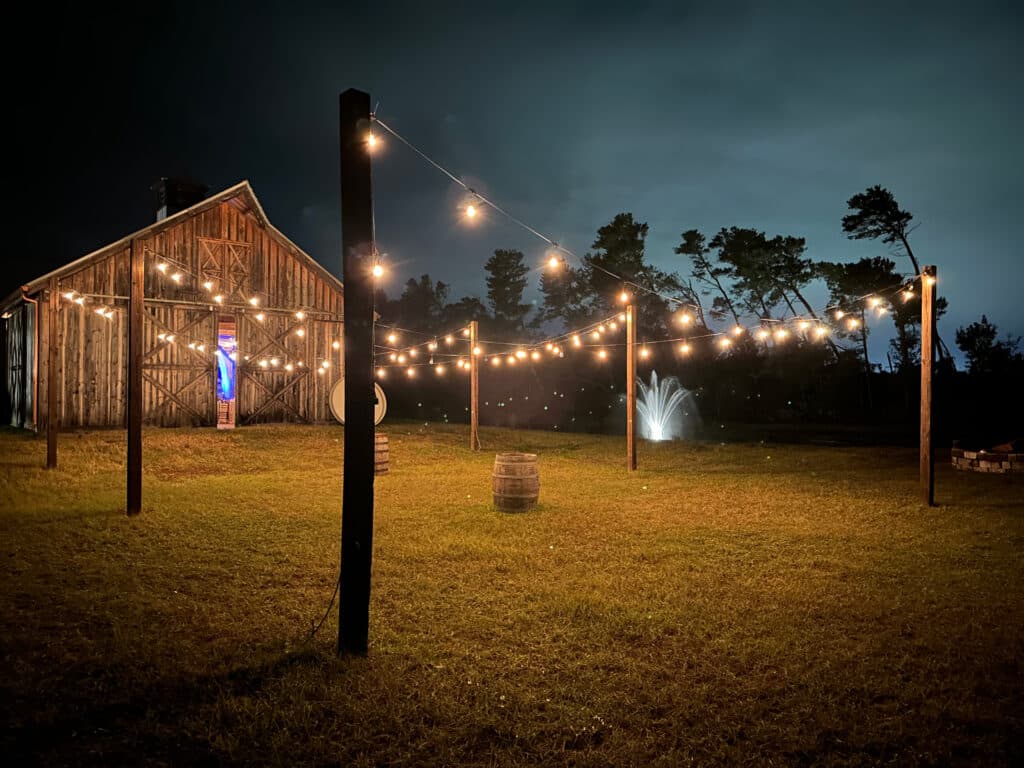 outdoor reception area under market lights ready to host your wedding at Bending Branch Ranch in New Smyrna Beach, FL