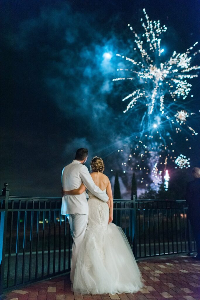 bride and groom watching blue fireworks from Orlando Special Effects