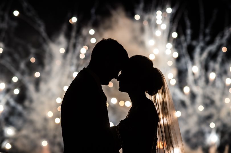 event coordinated by Fairy Tales & Wedding Bells with sparklers for bride and groom