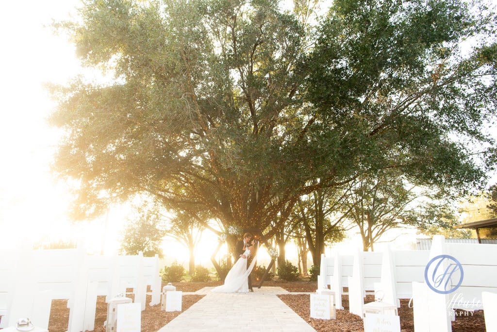 aisle of outdoor wedding ceremony site at Ever After Farms Citrus Barn