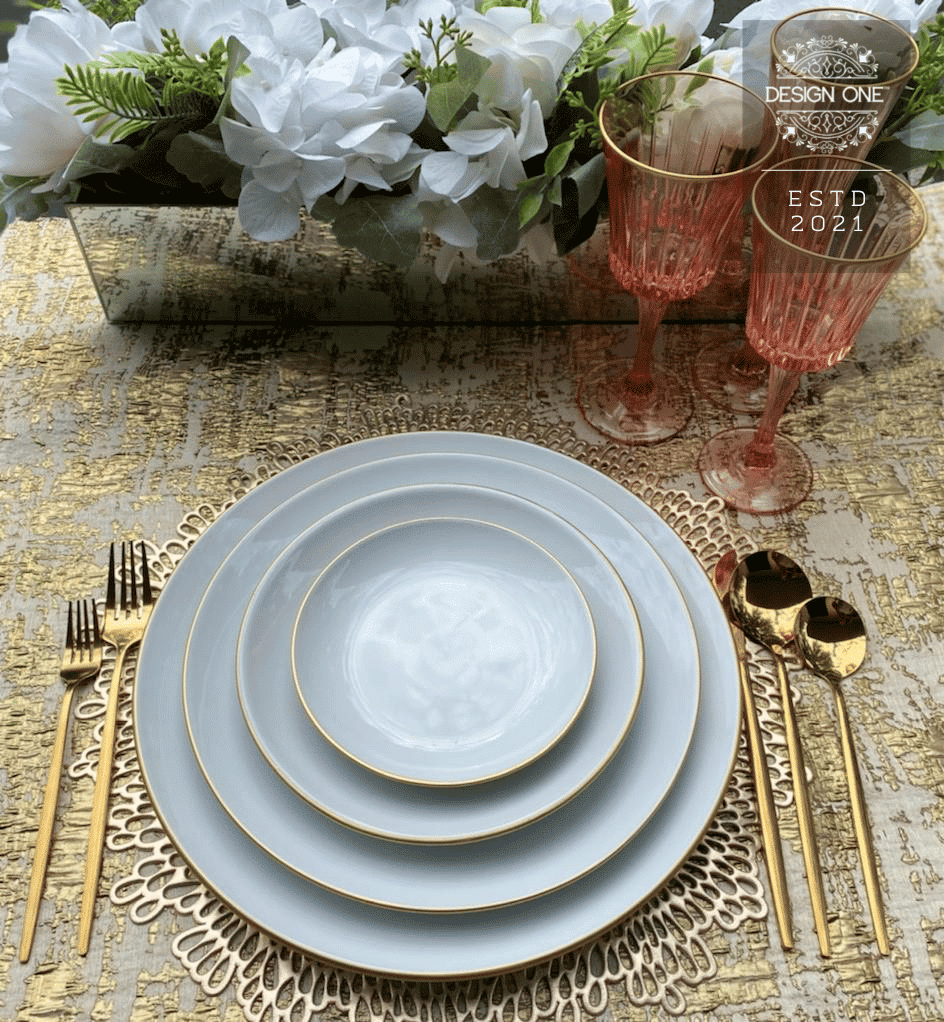 white dinnerware and gold flatware from Design One USA