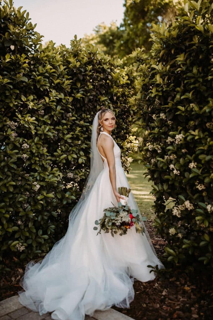 bride in secret garden at October Oaks Farm