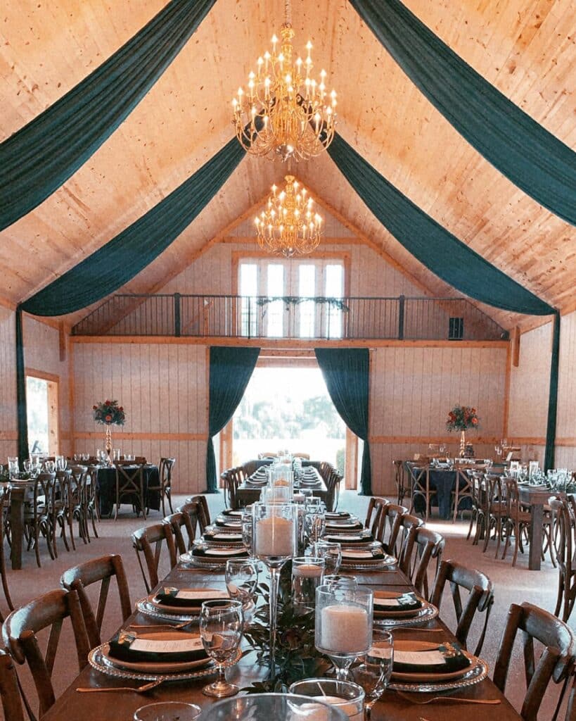 draped ceiling at October Oaks Farm fro wedding reception with chandeliers