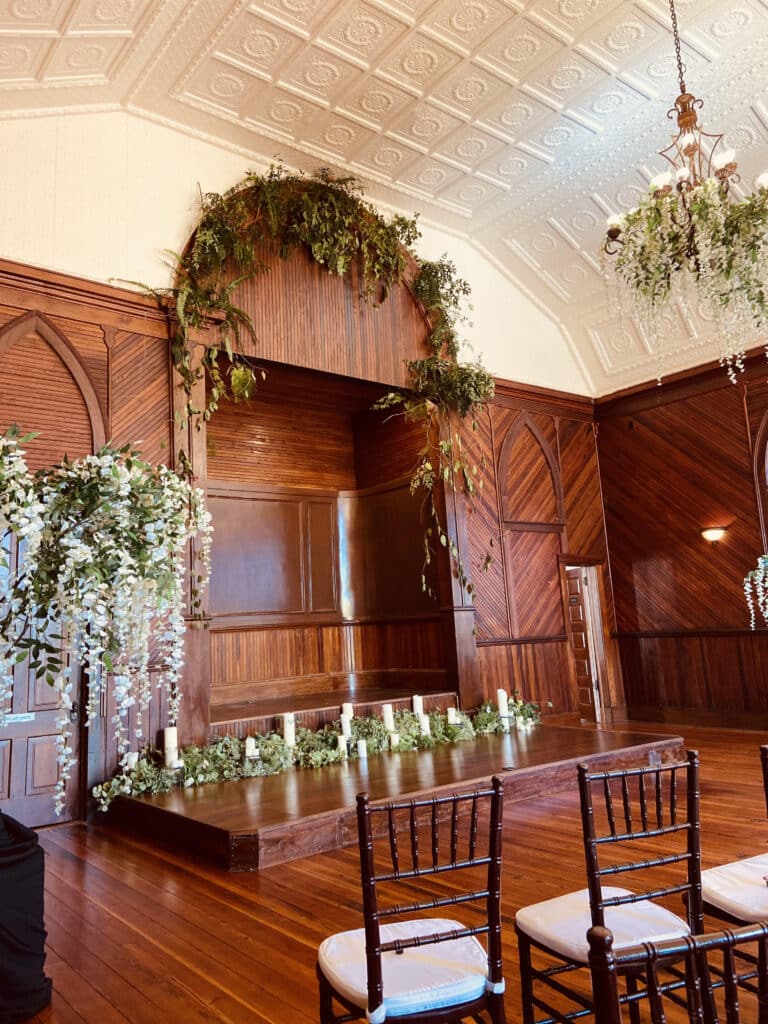 room with wood accents at THE 1883 Historic Venue