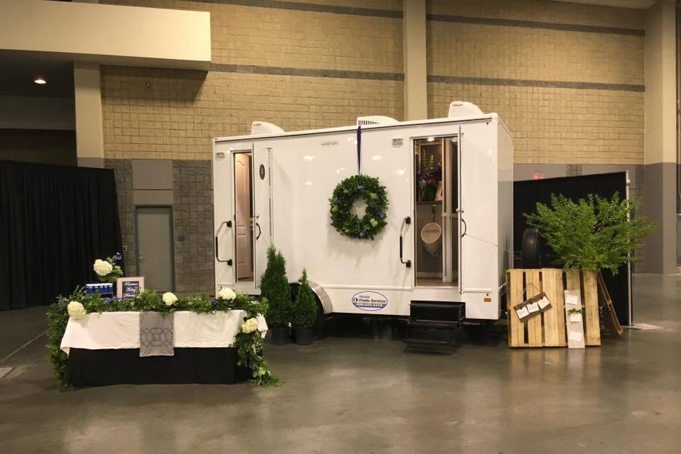 United Rentals Reliable Onsite Service comfort house with wreath on outside
