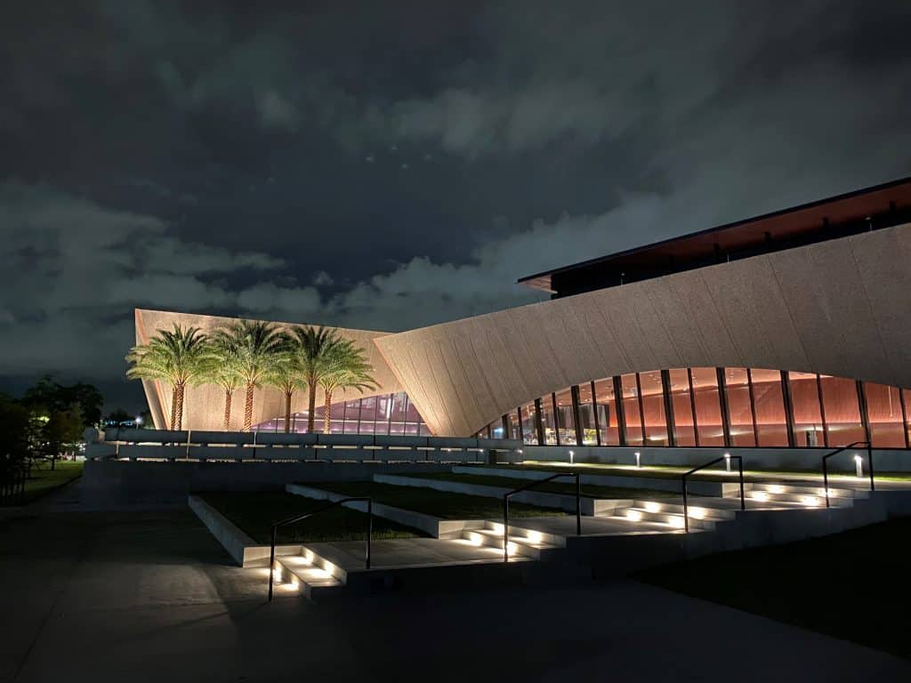 modern buildings with palm trees and landscape lighting at the Winter Park Events Center