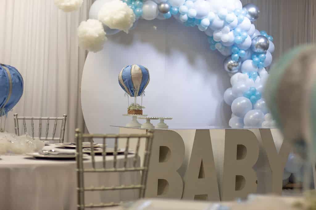 blue and white baby shower arch planned by Soulovevent LLC