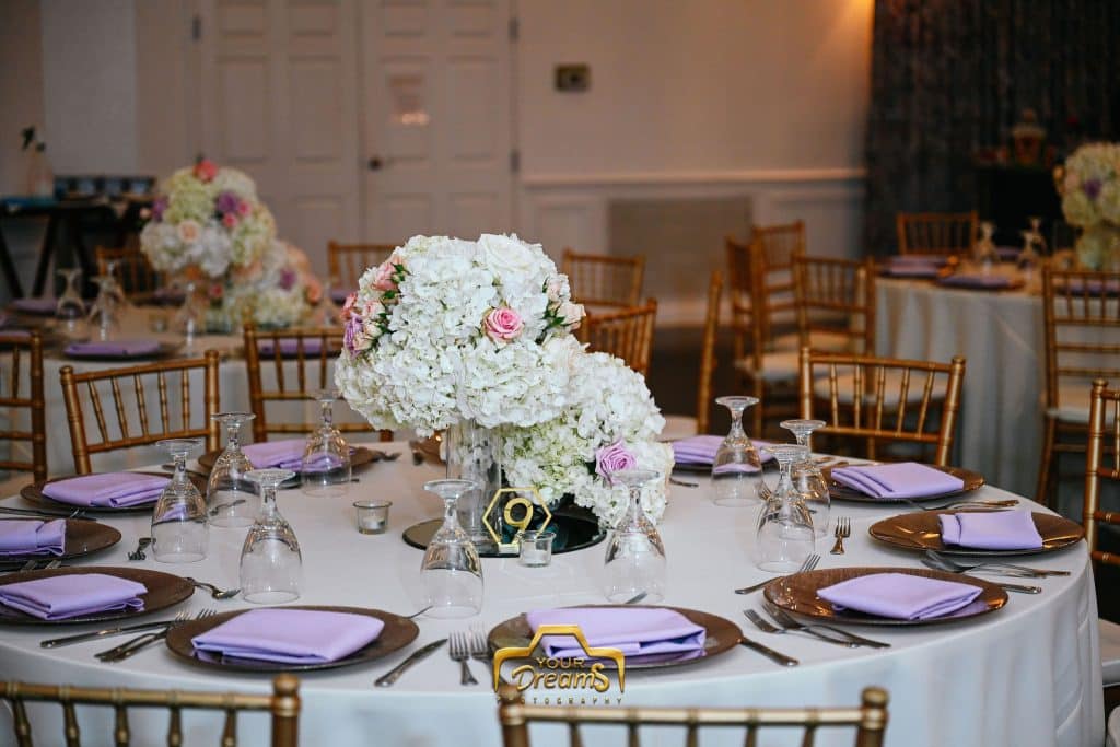 wedding reception tables set in pinks and whites planned by Soulovevent LLC