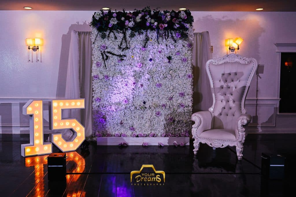 Quinceañera party with white throne and large 15 numbers planned by Soulovevent LLC