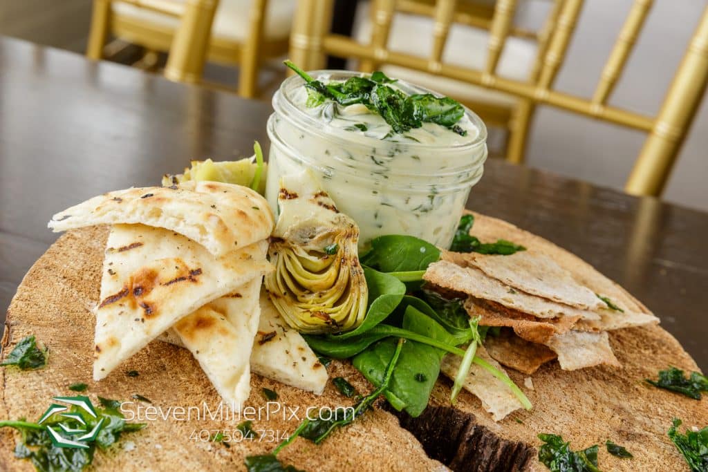 pita chips with tzatziki sauce by Dubsdread Catering