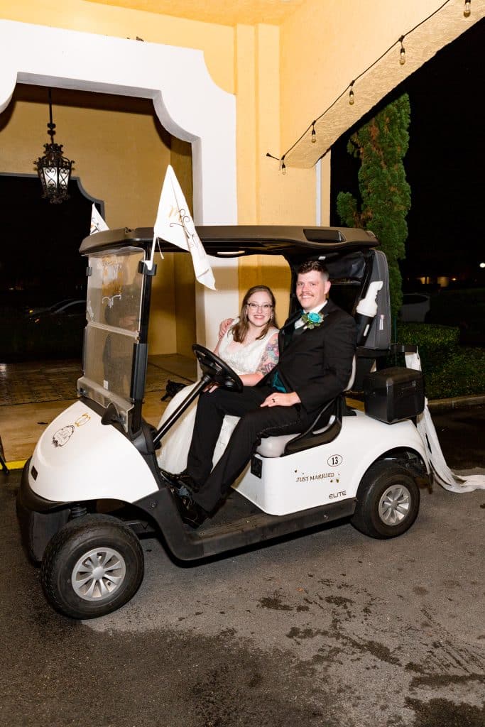 bride and groom on golf cart at La Cita Country Club