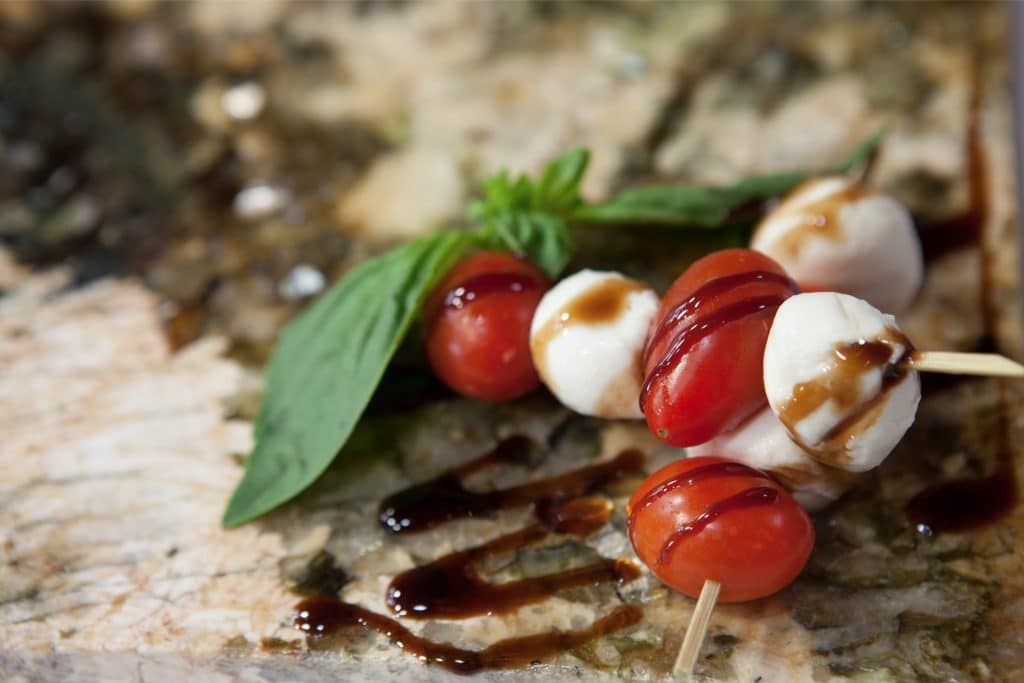 caaprese skewers of mozzarella, tomato and basil by Dubsdread Catering