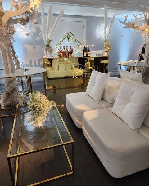 white furniture and glass and gold tables from Bubble Design Rentals Orlando