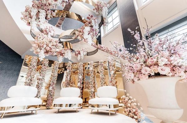 lush gold and white with pink floral accents furniture from Bubble Design Rentals Orlando