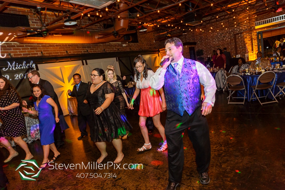 DJ from Elegant Entertainment DJ and Video Services Orlando leading dance party