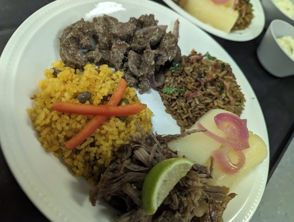 latin smorgasborg of multiple dishes from Latin Raices Catering