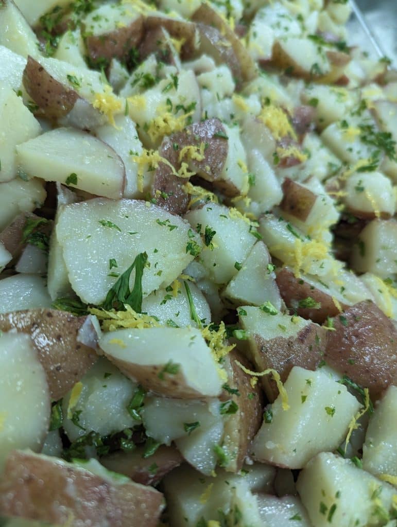 oven potatoes with cheese and parsley from Latin Raices Catering