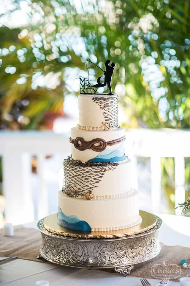 wedding cake with fishnet, waves and rope design by Cake & Bake