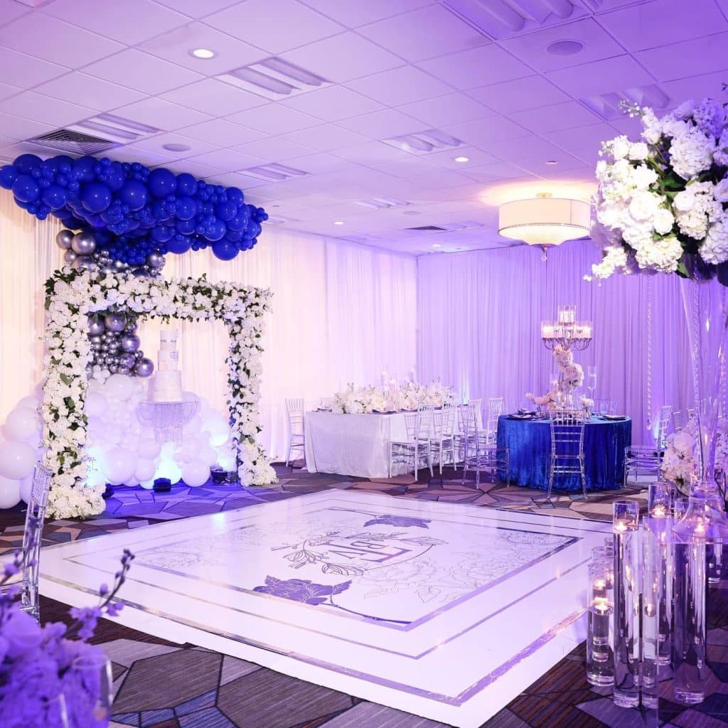 blue and white modern dance floor at wedding reception coordinated by glameventdesigns